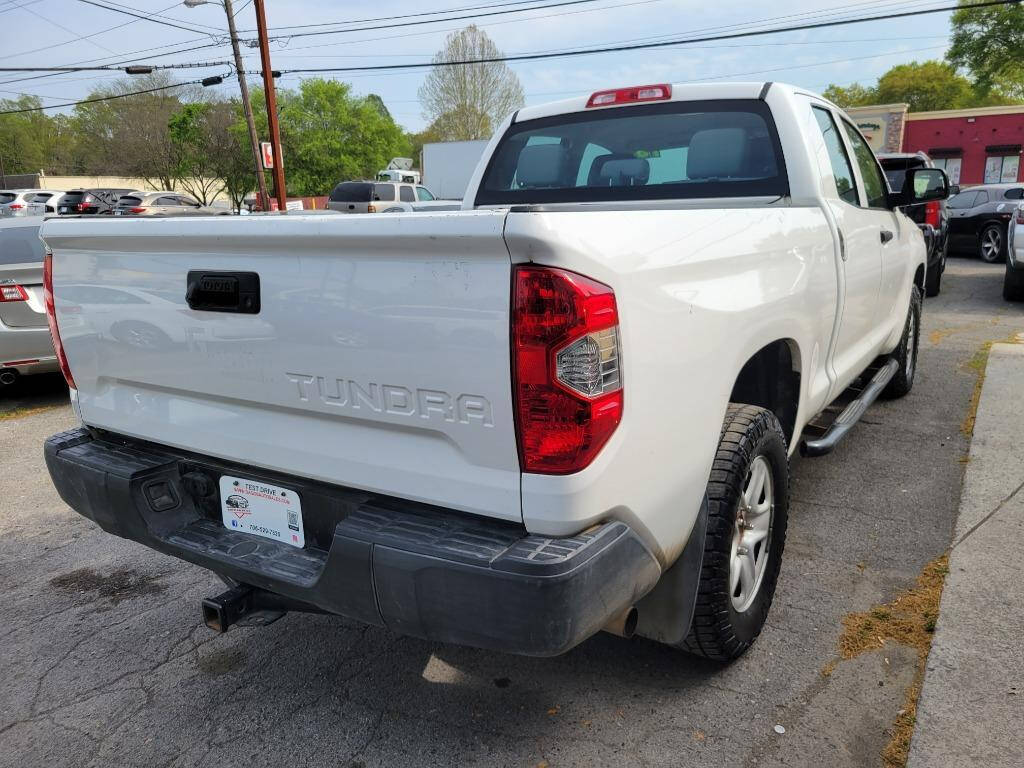 2016 Toyota Tundra for sale at DAGO'S AUTO SALES LLC in Dalton, GA