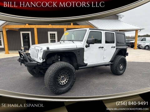 2014 Jeep Wrangler Unlimited for sale at BILL HANCOCK MOTORS LLC in Albertville AL