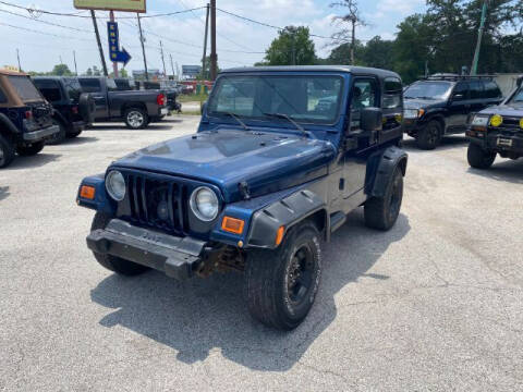 2004 Jeep Wrangler for sale at AUTO VALUE FINANCE INC in Houston TX