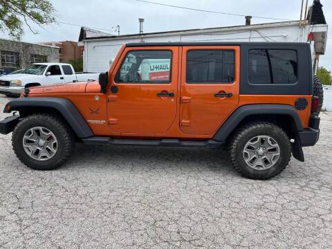 2010 Jeep Wrangler Unlimited for sale at VINE STREET MOTOR CO in Urbana IL