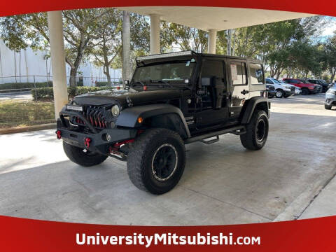 2013 Jeep Wrangler Unlimited for sale at University Mitsubishi in Davie FL