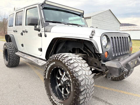 2011 Jeep Wrangler Unlimited for sale at CAR TRADE in Slatington PA