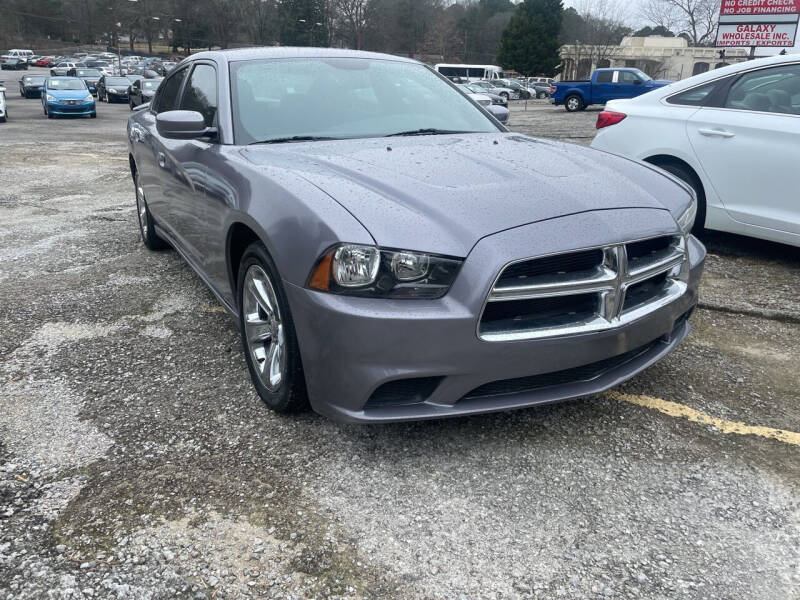 2013 Dodge Charger for sale at Certified Motors LLC in Mableton GA