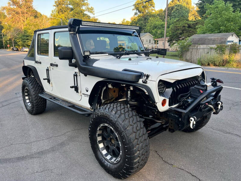 2009 Jeep Wrangler Unlimited for sale at Global Imports of Dalton LLC in Dalton GA