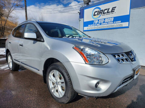 2013 Nissan Rogue for sale at Circle Auto Center Inc. in Colorado Springs CO