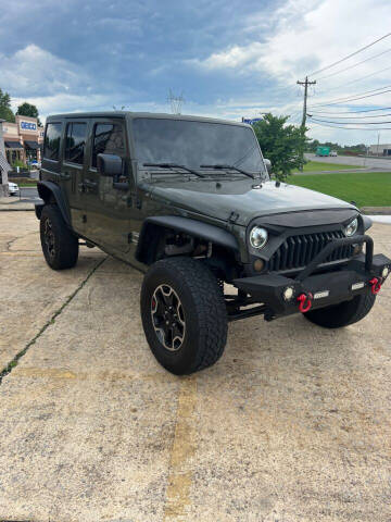 2015 Jeep Wrangler Unlimited for sale at Wolff Auto Sales in Clarksville TN