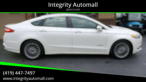 2013 Ford Fusion Hybrid for sale at Integrity Automall in Tiffin OH