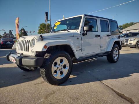 2015 Jeep Wrangler Unlimited for sale at Triangle Auto Sales 2 in Omaha NE
