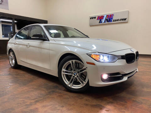 2013 BMW 3 Series for sale at Driveline LLC in Jacksonville FL