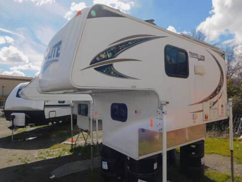 2017 TRAVEL-LITE OVERHEAD TRUCK CAMPER for sale at Gold Country RV in Auburn CA
