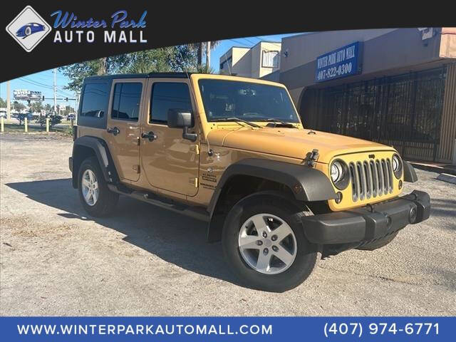 2014 Jeep Wrangler Unlimited for sale at Winter Park Auto Mall in Orlando, FL