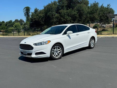 2015 Ford Fusion for sale at Empire Motors in Acton CA