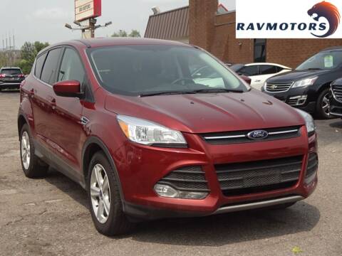 2014 Ford Escape for sale at RAVMOTORS in Burnsville MN