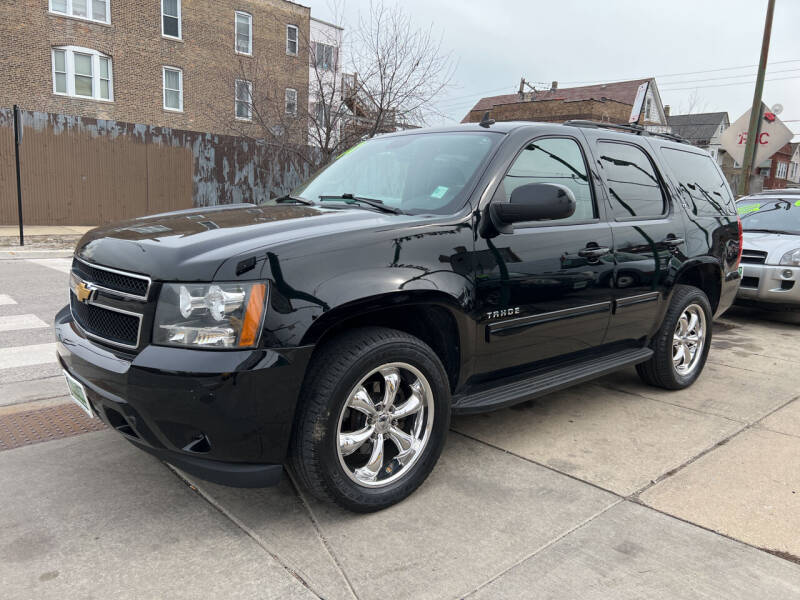 2012 Chevrolet Tahoe for sale at Barnes Auto Group in Chicago IL