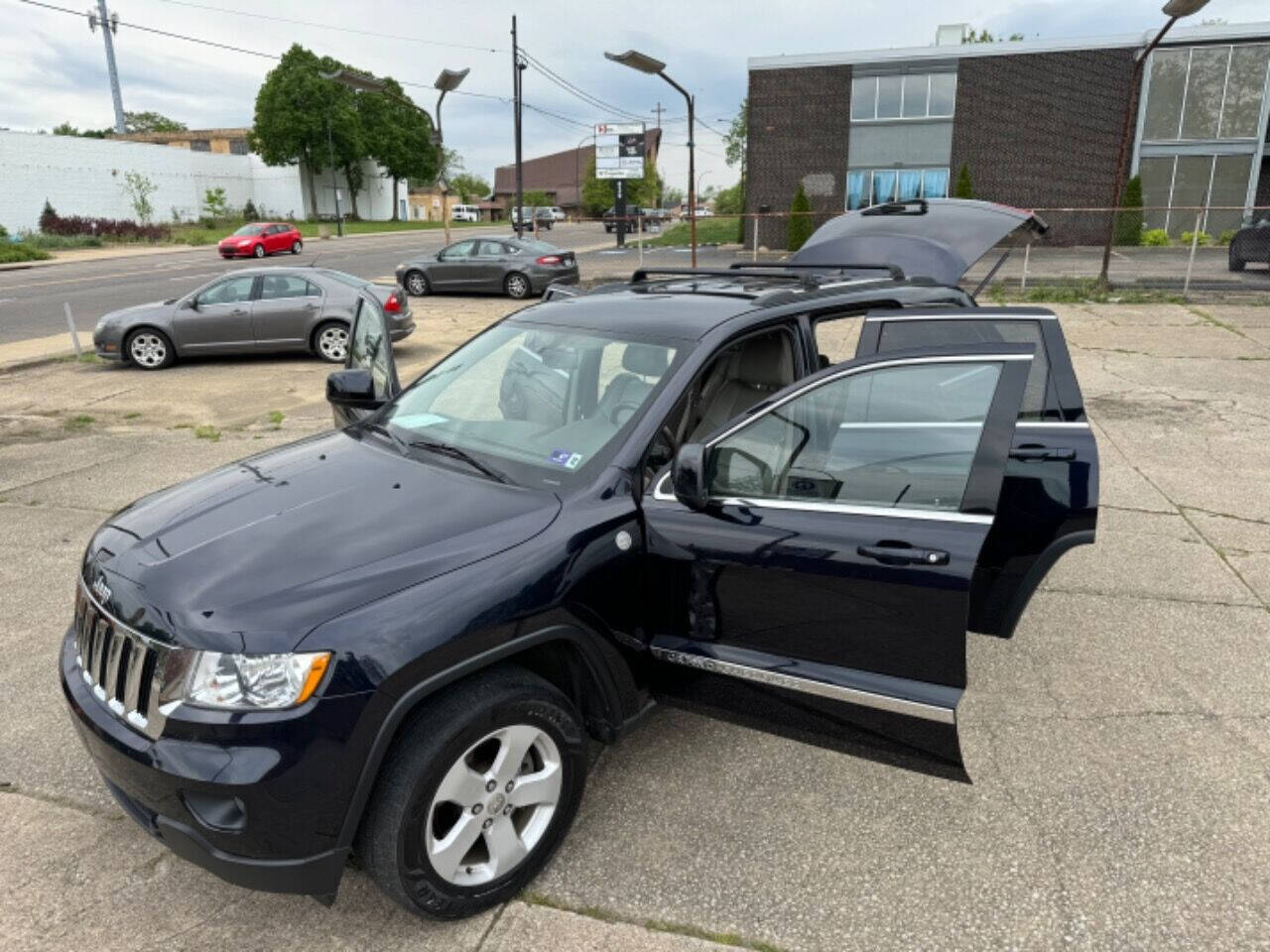 2011 Jeep Grand Cherokee for sale at First Class Auto Mall in Akron, OH