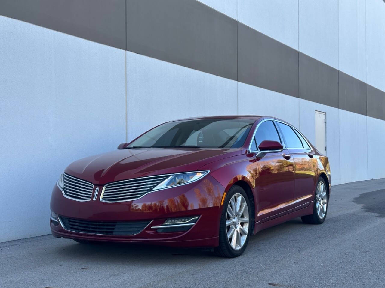 2015 Lincoln MKZ for sale at Phoenix Motor Co in Romulus, MI