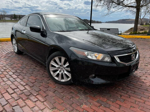 2009 Honda Accord for sale at PUTNAM AUTO SALES INC in Marietta OH