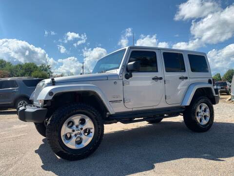 2012 Jeep Wrangler Unlimited for sale at CarWorx LLC in Dunn NC
