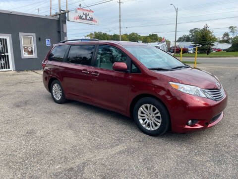 2015 Toyota Sienna for sale at Castle Cars Inc. in Lansing MI