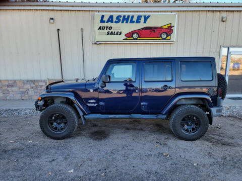 2013 Jeep Wrangler Unlimited for sale at Lashley Auto Sales in Mitchell NE