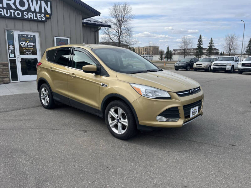 Used 2014 Ford Escape SE with VIN 1FMCU9GX4EUC68375 for sale in Grand Forks, ND