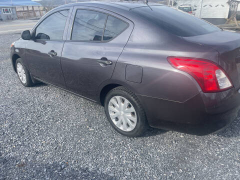 2015 Nissan Versa for sale at CESSNA MOTORS INC in Bedford PA