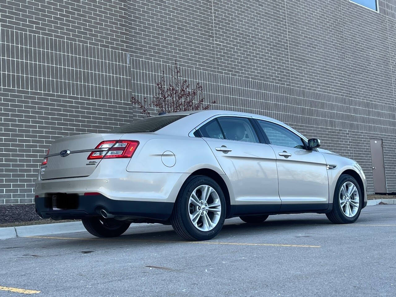 2018 Ford Taurus for sale at Phoenix Motor Co in Romulus, MI