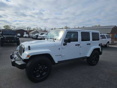 2015 Jeep Wrangler Unlimited for sale at CarTime in Rogers AR