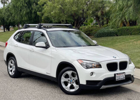 2014 BMW X1 for sale at MILLENNIUM MOTORS in Van Nuys CA