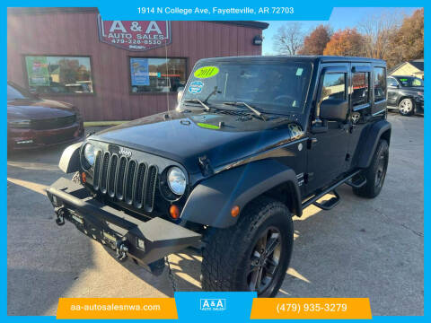 2011 Jeep Wrangler Unlimited for sale at A & A Auto Sales in Fayetteville AR