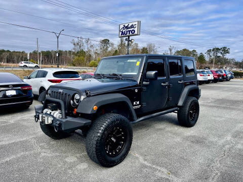 2009 Jeep Wrangler Unlimited for sale at J. MARTIN AUTO in Richmond Hill GA