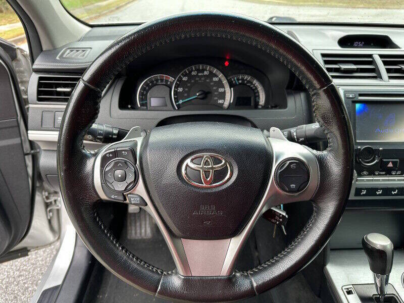 2012 Toyota Camry for sale at SHURE AUTO SALES in Snellville, GA