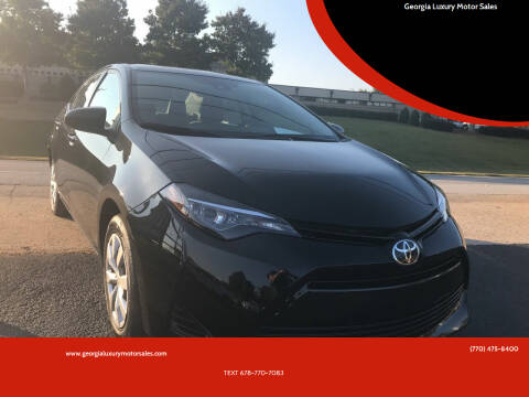 2017 Toyota Corolla for sale at Georgia Luxury Motor Sales in Cumming GA