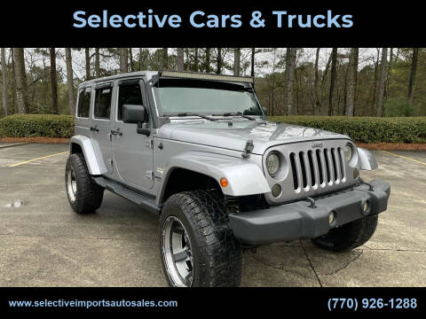 2014 Jeep Wrangler Unlimited for sale at SELECTIVE IMPORTS in Woodstock GA