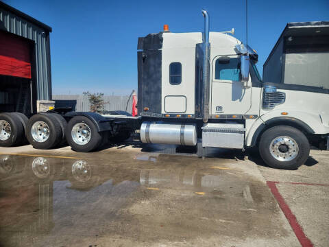 2013 Freightliner SD122 CORONADO