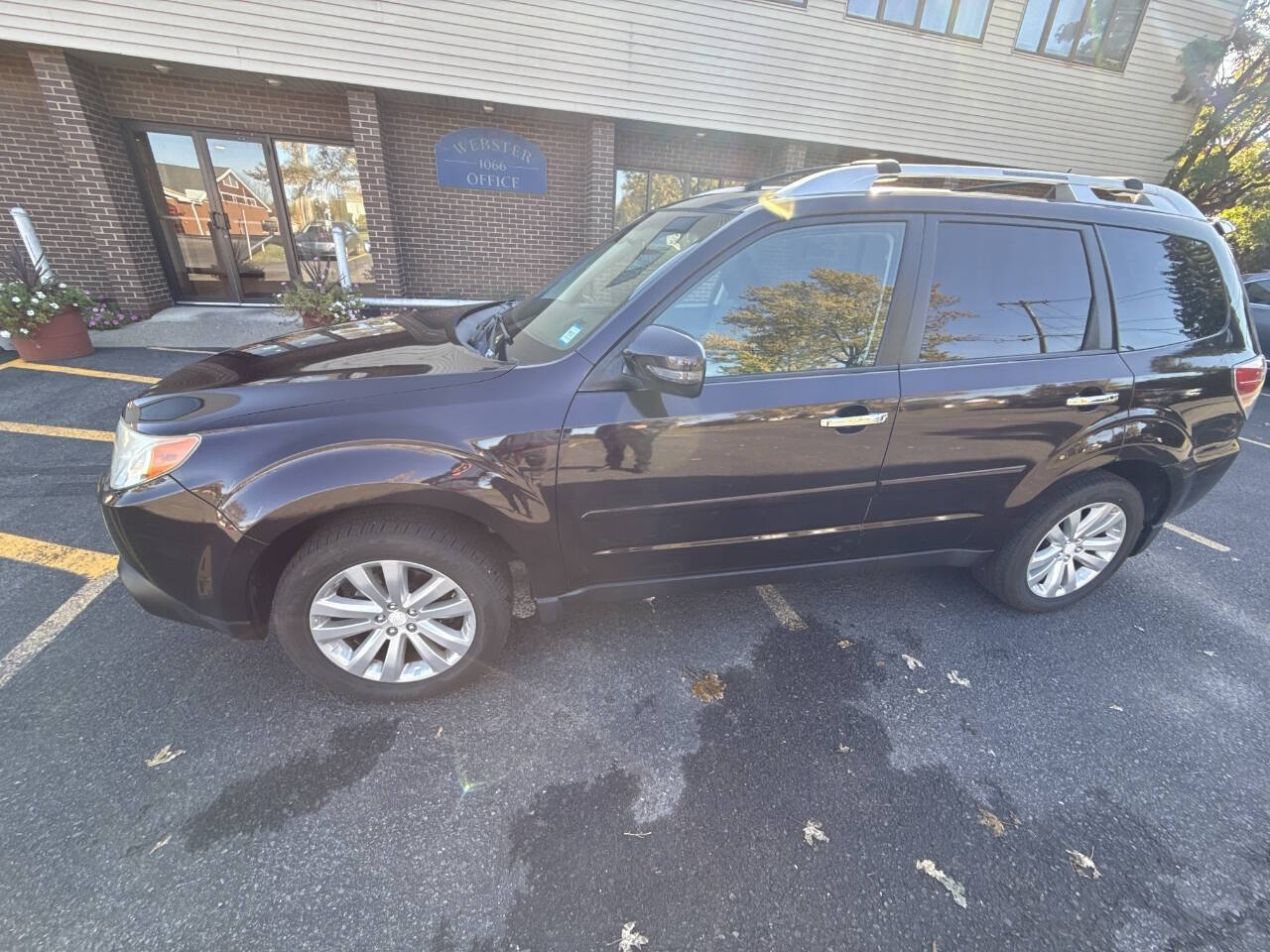 2013 Subaru Forester for sale at Rochester Imports LLC in Webster, NY