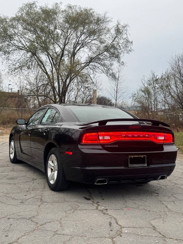 2012 Dodge Charger for sale at H & H AUTO GROUP in Detroit, MI