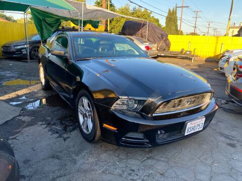 2014 Ford Mustang for sale at Crown Auto Inc in South Gate CA