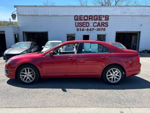 2010 Ford Fusion for sale at George's Used Cars Inc in Orbisonia PA