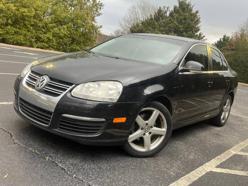 2010 Volkswagen Jetta for sale at Cheko SW Auto Sales LLC in Suwanee GA