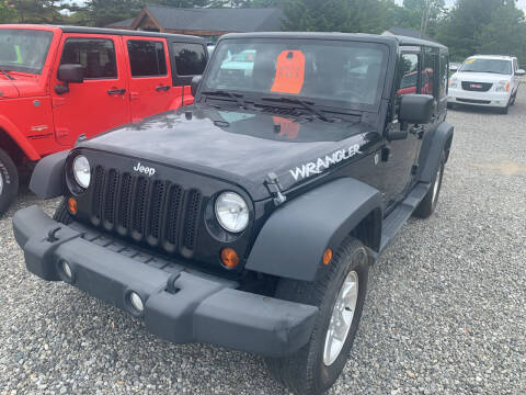 2012 Jeep Wrangler Unlimited for sale at Leonard Enterprise Used Cars in Orion Township MI