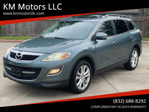 2011 Mazda CX-9 for sale at KM Motors LLC in Houston TX