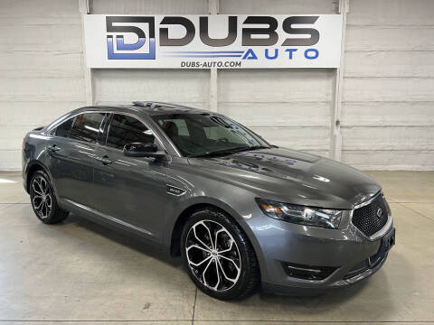 2016 Ford Taurus for sale at DUBS AUTO LLC in Clearfield UT