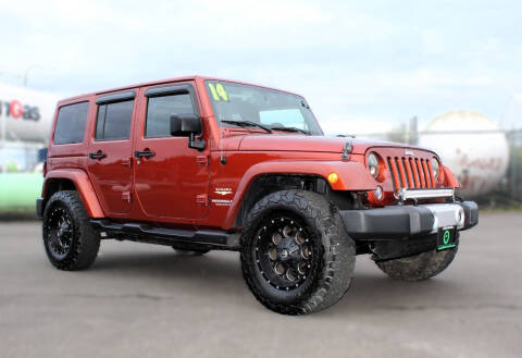 2014 Jeep Wrangler Unlimited for sale at GQ Motorsports in Auburn WA
