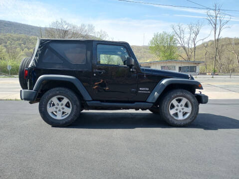 2015 Jeep Wrangler for sale at Jaxx Auto Outlet in Yeagertown PA