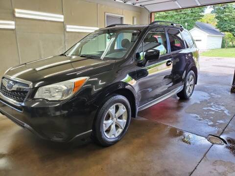 2014 Subaru Forester for sale at MADDEN MOTORS INC in Peru IN