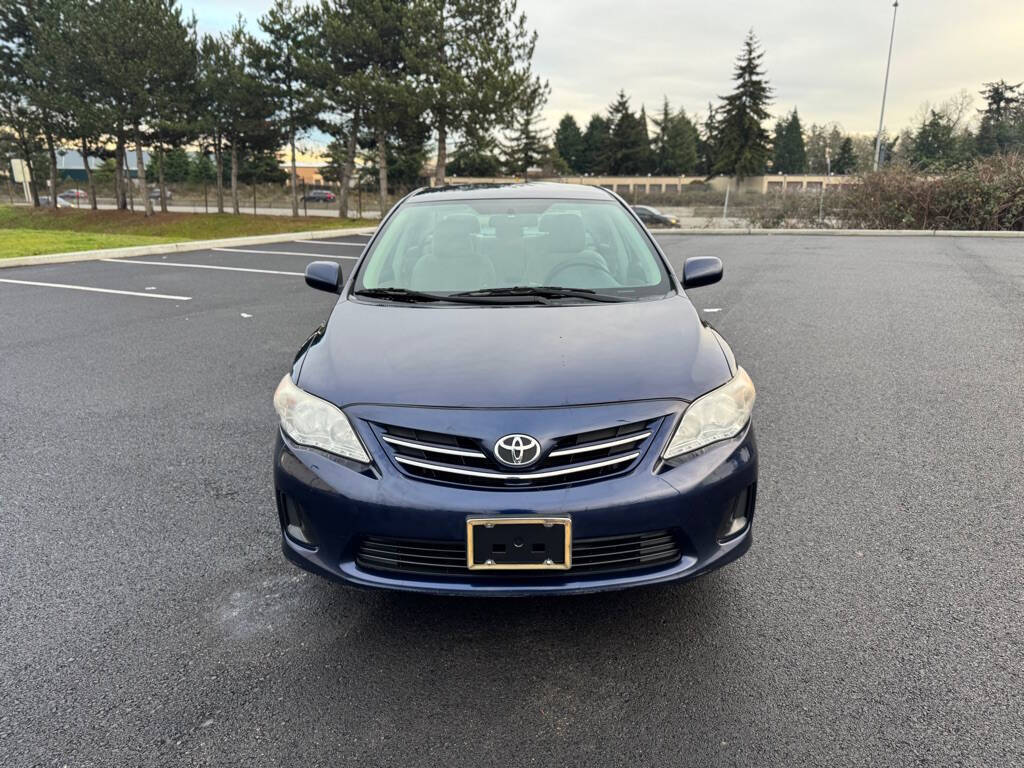 2013 Toyota Corolla for sale at The Price King Auto in LAKEWOOD, WA