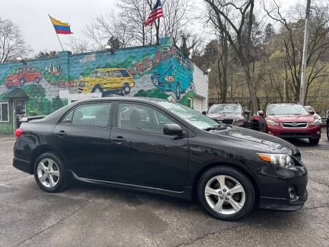 2013 Toyota Corolla for sale at SHOWCASE MOTORS LLC in Pittsburgh PA
