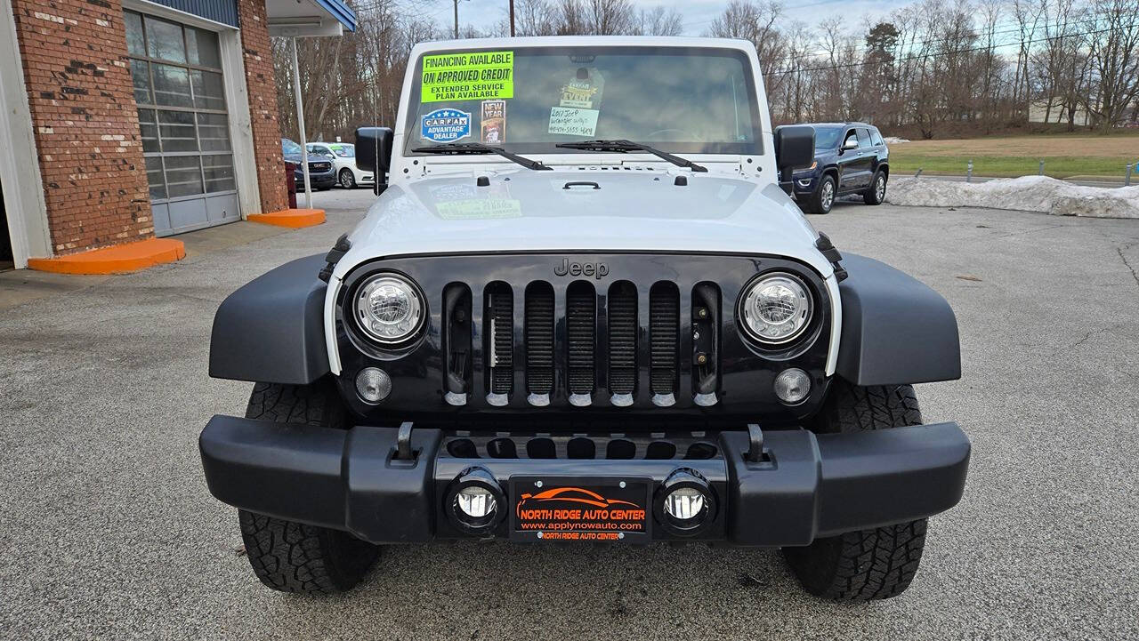 2017 Jeep Wrangler Unlimited for sale at North Ridge Auto Center LLC in Madison, OH