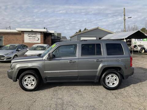 2014 Jeep Patriot for sale at Autocom, LLC in Clayton NC